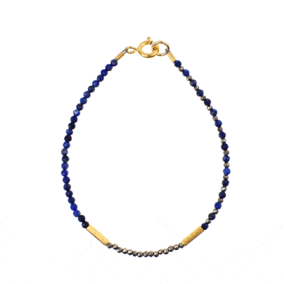 Handmade bracelet with natural, spherical shaped lapis lazulis and pyrite gemstones and decorative elements made of gold plated sterling silver.