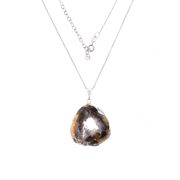 Pendant made of natural agate gemstone with crystal quartz and hypoallergenic silver plated metal. The agate is polished on both sides and the pendant is threaded on a sterling silver chain with adjustable length. Buy online shop.