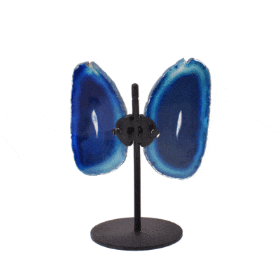 Butterfly with wings made from polished slices of natural blue agate gemstone, placed on a black, metallic base. The butterfly has a size of 17cm.