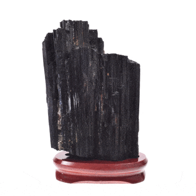 Raw 21cm piece of natural black tourmaline gemstone. The tourmaline comes with a wooden base. Buy online shop.