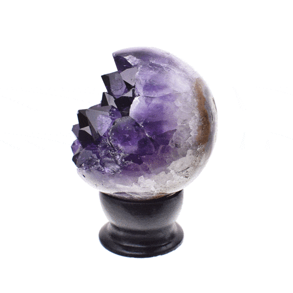 Polished 8cm sphere made from natural amethyst geode gemstone. The sphere comes with a black wooden base.