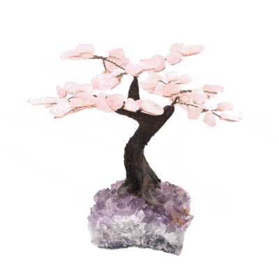 Handmade tree with leaves of natural baroque rose quartz gemstones and natural amethyst base. The tree has a height of 17cm. 