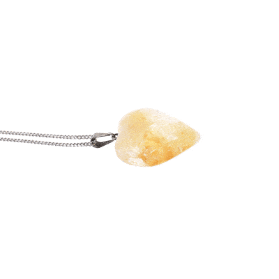 Pendant made from natural citrine quartz gemstone, in the heart shape. The pendant is threaded on a sterling silver chain. 