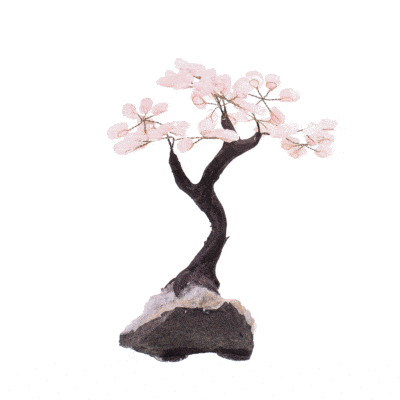 Handmade tree with leaves of natural baroque rose quartz gemstones and natural amethyst base. The tree has a height of 22cm. 