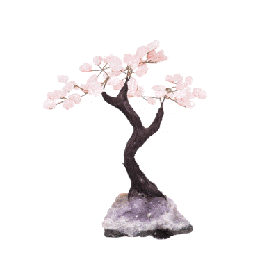 Handmade tree with leaves of natural baroque rose quartz gemstones and natural amethyst base. The tree has a height of 22cm. 