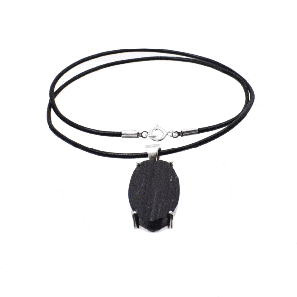 Handmade pendant made of sterling silver and natural, oval shaped black tourmaline gemstone, threaded on a black leather with sterling silver clasp.