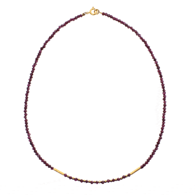 Handmade necklace with natural, faceted, rhombic shaped garnet and spherical shaped pyrite gemstones. The necklace has a clasp and decorative elements made of gold plated sterling silver.