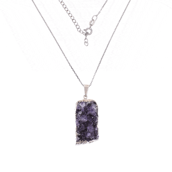 Pendant made of hypoallergenic silver plated metal and natural amethyst gemstone in a raw form. The pendant is threaded on a sterling silver chain with adjustable length. Buy online shop.