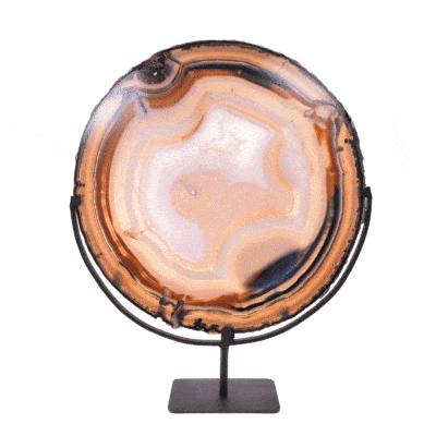 Polished slice of natural agate gemstone with crystal quartz, placed on a black metallic base. The slice of agate with the base has a height of 43.5cm. Buy online shop.