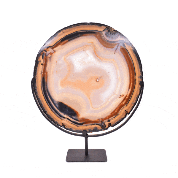 Polished slice of natural agate gemstone with crystal quartz, placed on a black metallic base. The slice of agate with the base has a height of 43.5cm. Buy online shop.