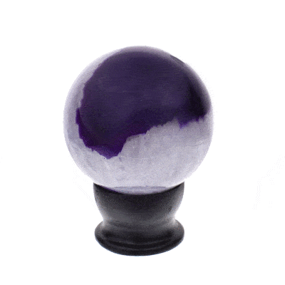 Polished sphere made from natural purple agate gemstone. The sphere has a diameter of 7.5cm and it comes with a black wooden base.