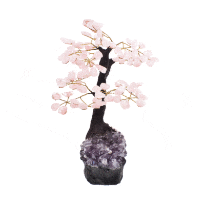 Handmade tree with leaves of natural baroque rose quartz gemstones and natural amethyst base. The tree has a height of 29cm. 