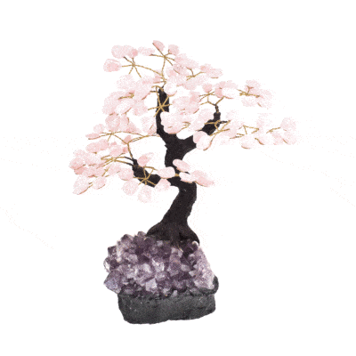 Handmade tree with leaves of natural baroque rose quartz gemstones and natural amethyst base. The tree has a height of 29cm. 