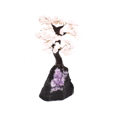 Handmade tree with leaves of natural baroque rose quartz gemstones and natural amethyst base. The tree has a height of 27cm. 