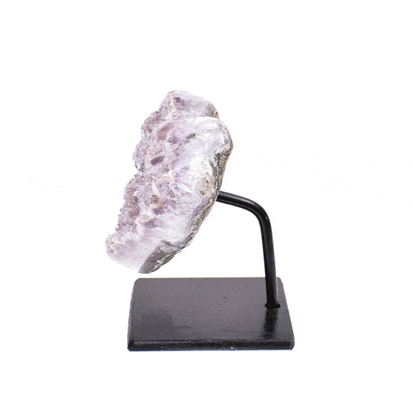 Natural amethyst gemstone in the shape of a heart, embedded into a black, metallic base. The product has a height of 6cm. Buy online shop.