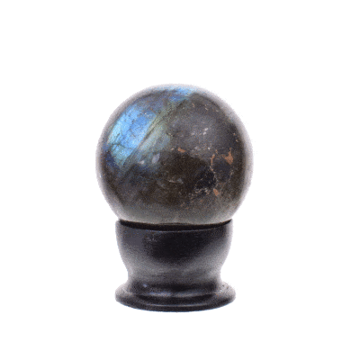 Polished 5.5 diameter sphere made from natural labradorite gemstone. The sphere comes with a black, wooden base. 