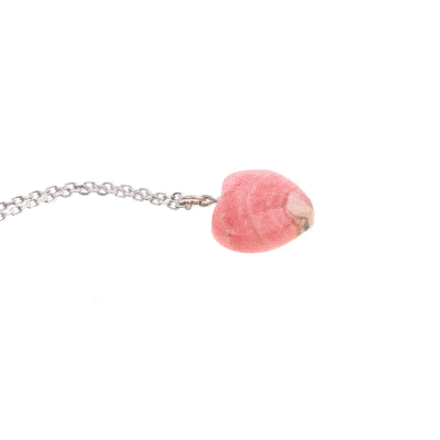 Handcrafted heart-shaped pendant made from natural rhodochrosite gemstone. The pendant is threaded on a handmade sterling silver chain.