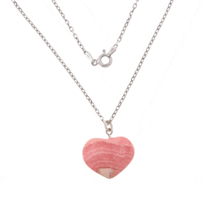 Handcrafted heart-shaped pendant made from natural rhodochrosite gemstone. The pendant is threaded on a handmade sterling silver chain.