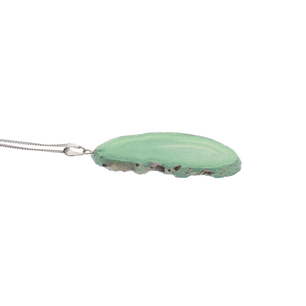 Pendant made of natural, polished slice of green agate gemstone, threaded on a sterling silver chain. 