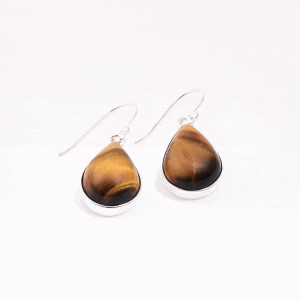 Handmade long earrings made of sterling silver and natural tiger's eye gemstone in a teardrop shape. Buy online shop.