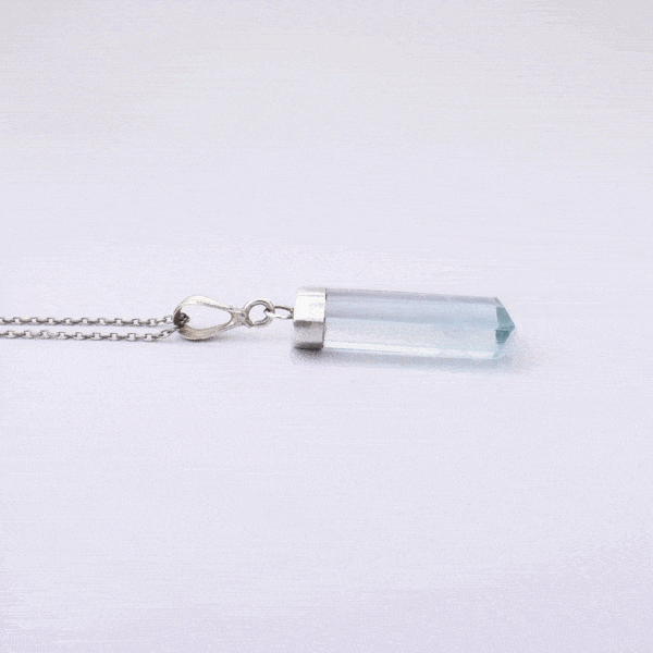 Handmade pendant made of natural aquamarine gemstone and sterling silver, threaded on a silver chain. Buy online shop.