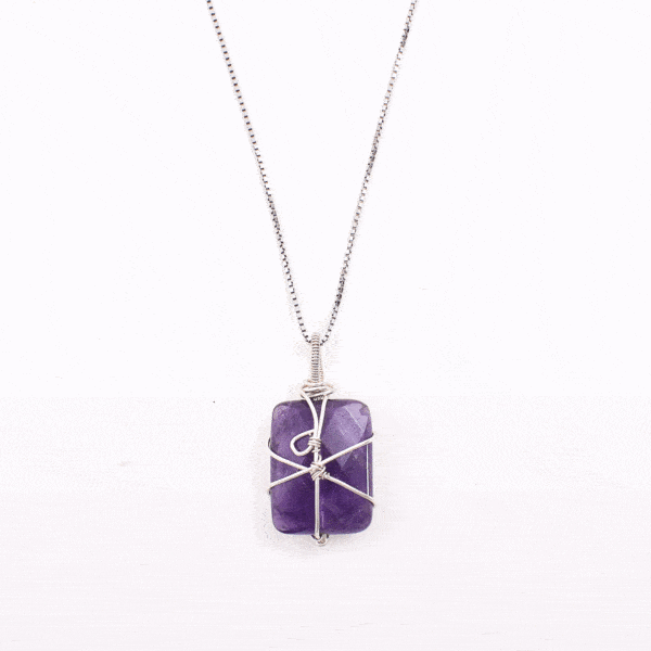 Handmade wiring setting pendant made of natural, parallelogram shaped amethyst gemstone and sterling silver. The pendant is threaded on a sterling silver chain. Buy online shop.