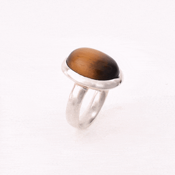 Handmade ring made of sterling silver and natural tiger's eye gemstone in an oval shape. Buy online shop.