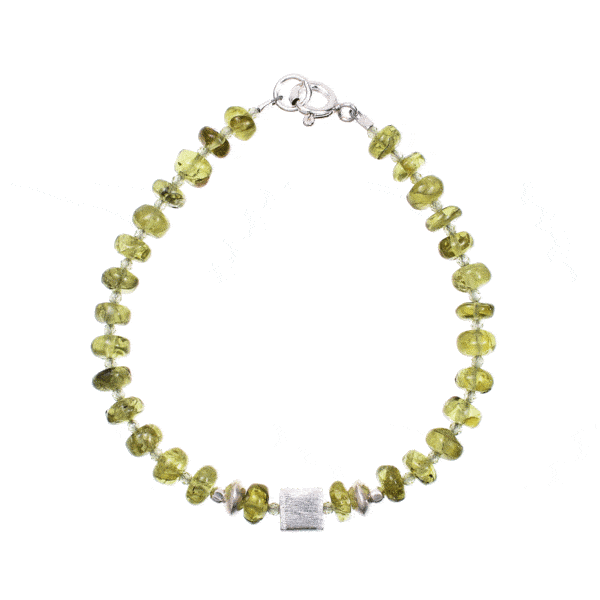 Handmade bracelet made of natural, wheel and spherical shaped peridot gemstones, decorated with sterling silver elements. Buy online shop.