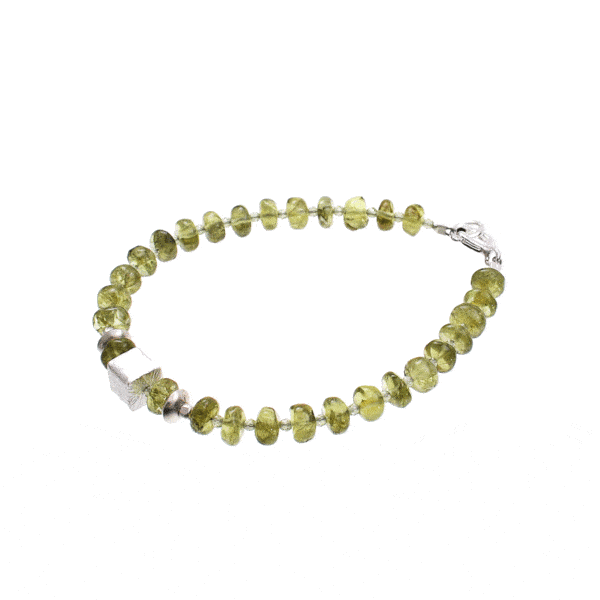 Handmade bracelet made of natural, wheel and spherical shaped peridot gemstones, decorated with sterling silver elements. Buy online shop.