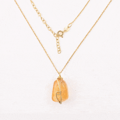 Handmade wiring setting pendant made of natural citrine quartz gemstone and gold plated sterling silver. The pendant is threaded on an adjustable gold plated sterling silver chain. 