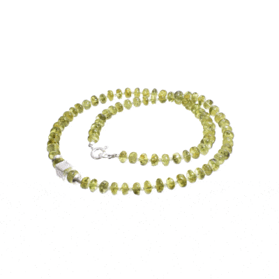 Handmade necklace made of natural, wheel and spherical shaped peridot gemstones, decorated with sterling silver elements. Buy online shop.