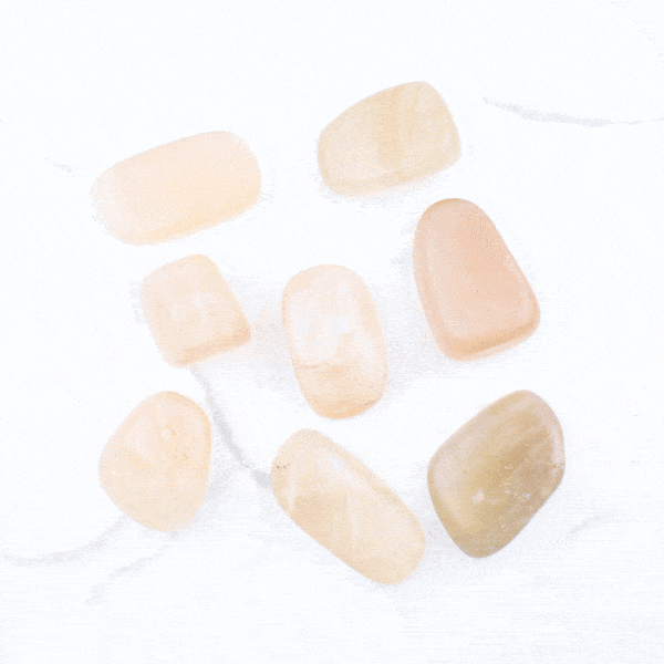 Natural tumbled moonstone gemstones, ranging from 2cm to 3cm. Buy online shop.