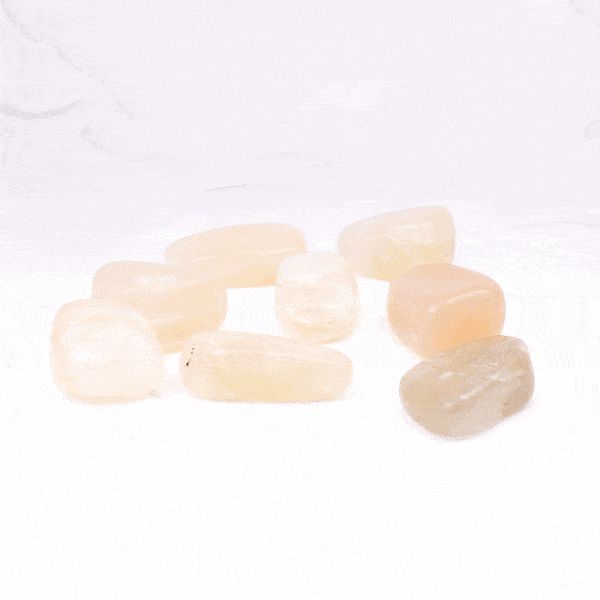 Natural tumbled moonstone gemstones, ranging from 2cm to 3cm. Buy online shop.