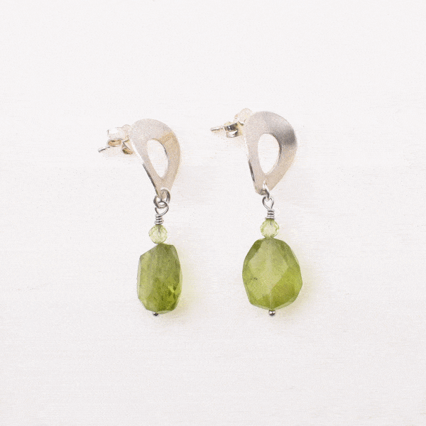 Handmade, long sterling silver earrings with natural, oval and spherical shaped peridot gemstones. Buy online shop.