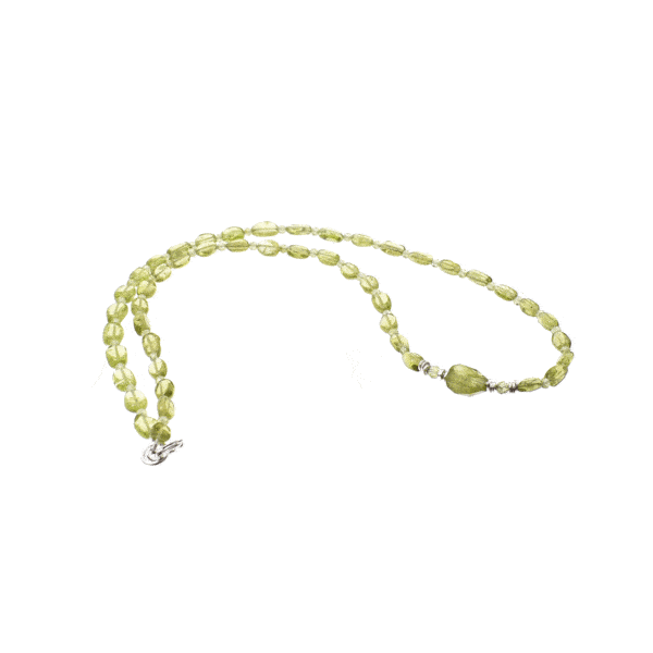 Handmade necklace made of natural, oval and spherical shaped peridot gemstones, decorated with sterling silver elements. Buy online shop.