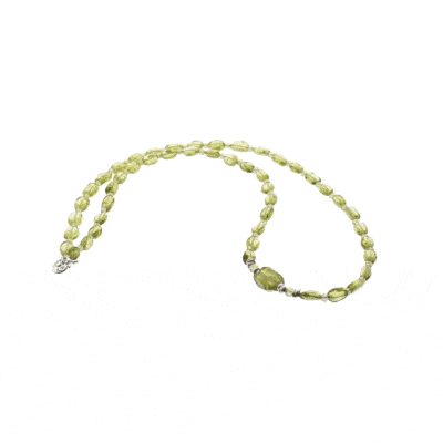 Handmade necklace made of natural, oval and spherical shaped peridot gemstones, decorated with sterling silver elements. Buy online shop.