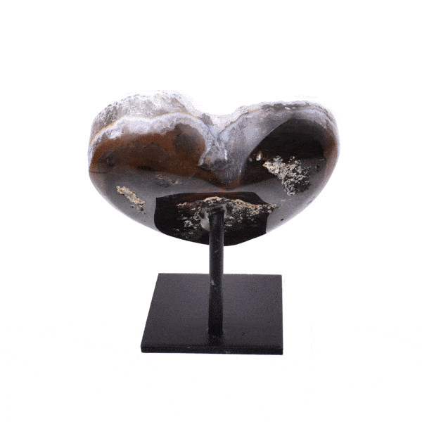 Natural heart shaped agate gemstone with crystal quartz, embedded into a black, metallic base. The product has a height of 6cm. 