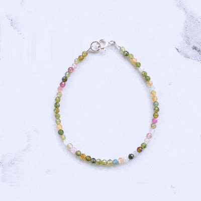 Handmade bracelet made of natural, faceted, multicolored tourmaline gemstones and sterling silver clasp. 