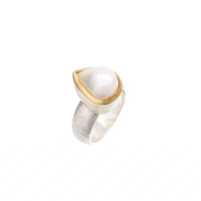 Handmade ring made of sterling silver and natural, teardrop shaped pearl. The ring has textured band and gold plated bezel. 