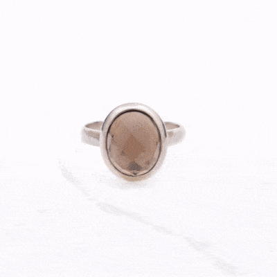 Handmade ring made of sterling silver and natural, faceted, oval shaped smoky quartz gemstone. 