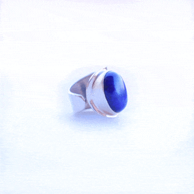 Handmade sterling silver ring with natural, oval shaped lapis lazuli gemstone. The size of the ring is adjustable. 