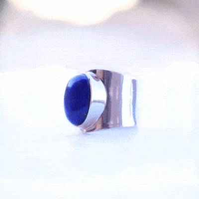 Handmade sterling silver ring with natural, oval shaped lapis lazuli gemstone. The size of the ring is adjustable. 