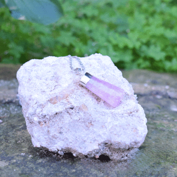 Handmade sterling silver necklace with natural, rough pink tourmaline gemstone. 